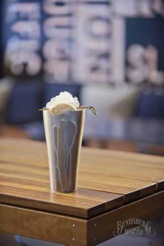 Black Milk Cocktail garnish with a curly straw