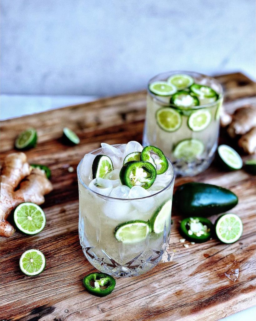 Jalapeno Ginger Mule Cocktail garnished with extra jalapeno and lime