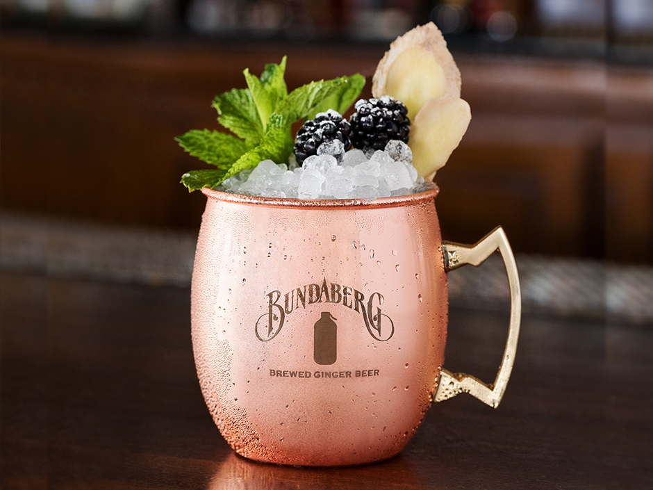 Kentucky Mule Cocktail made with Bundaberg Ginger Beer, served in copper mug with ice and garnishes